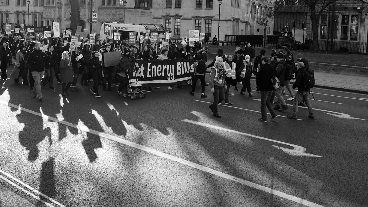 Cost of living protest at Parliament Square, London, 12 February 2022. (Credit: [Alisdare Hickson](https://commons.wikimedia.org/wiki/File:Cost_of_living_protest_at_Parliament_Square,_London.jpg), CC BY-SA 4.0.)
