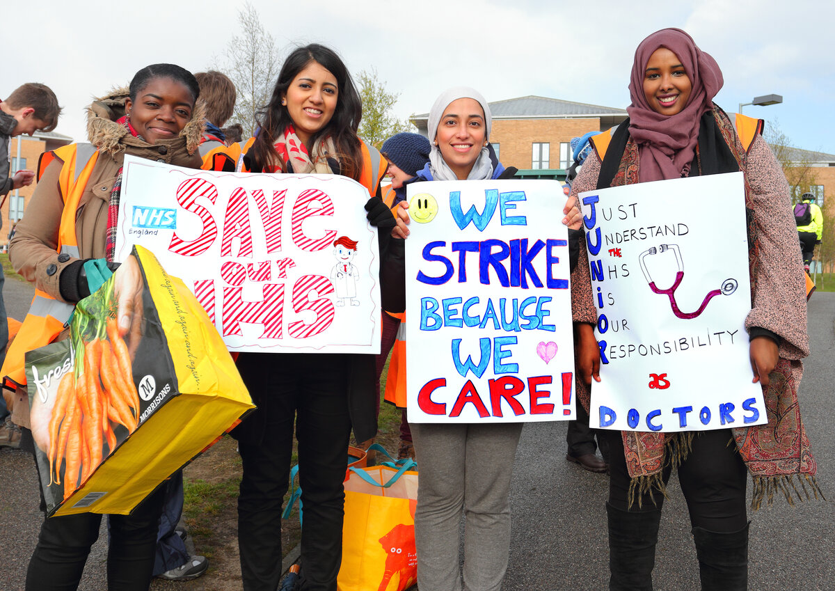 Junior Doctors on strike outside Norfolk and Norwich University Hospital, 26 April 2016. (Credit: [Katy Jon Went](https://commons.wikimedia.org/wiki/File:4_of_the_earliest_Junior_Doctors_outside_Norfolk_and_Norwich_University_Hospital_NNUH_A3_(26649205806).jpg), CC BY 2.0.)